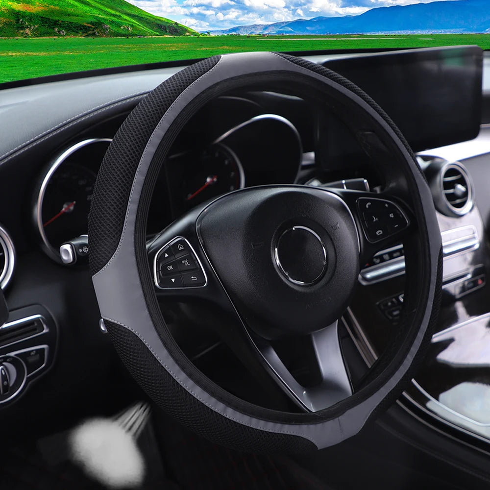 A mesh leather breathable comfort New stretch car steering wheel cover without inner rim fits 14.5- to 15-inch car interiors